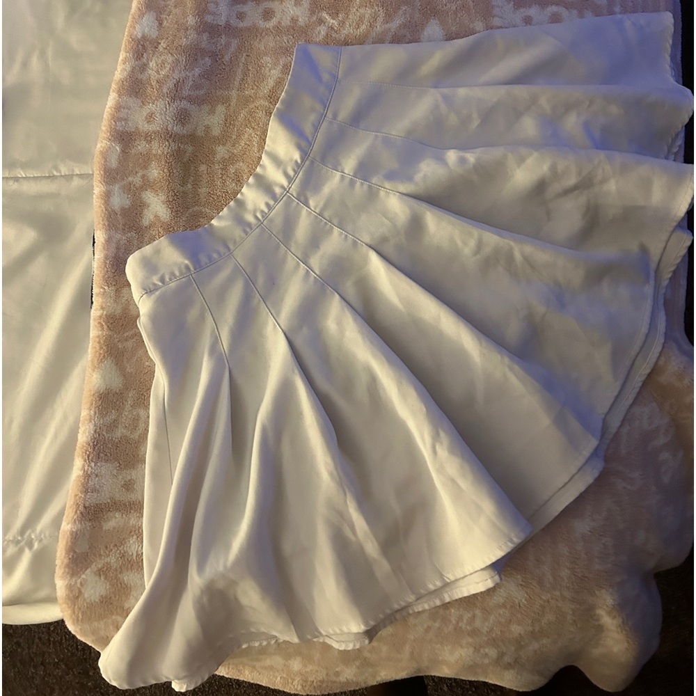 White pleated skirt